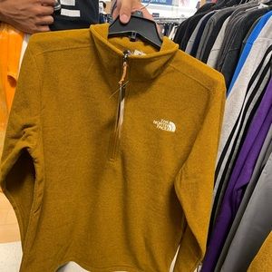The North Face sweatshirt.